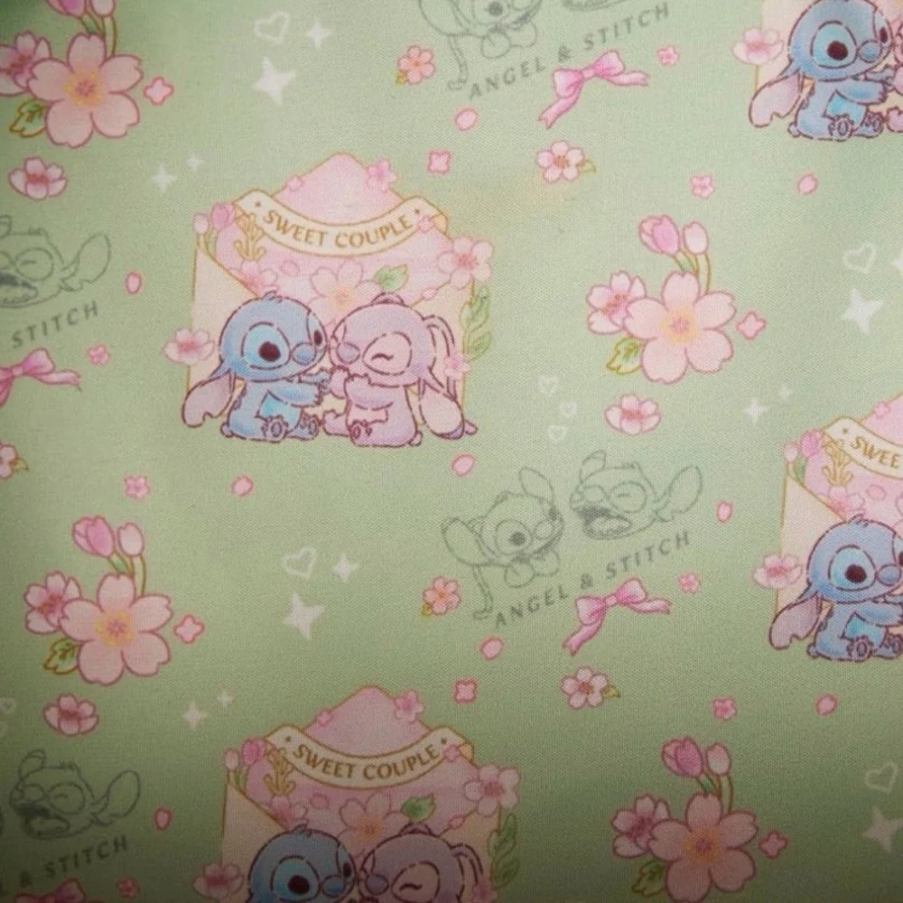 Disney Loungefly  Stitch & Angel Cherry Blossom Heart Mini Backpack NWOT.